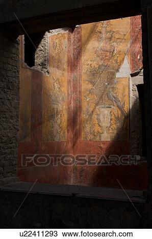 In the shadow of Vesuvius, the ruins of the Imperial Villa of Oplontis - detail of frescoes in guest rooms with architectural detail of window frame View Large Photo Image Stock Image - In the shadow of Vesuvius, the ruins of the Imperial Villa of Oplontis - detail of frescoes in guest rooms with architectural detail of window frame. Fotosearch