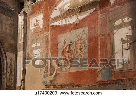 Stock Photo - In the shadow of Vesuvius, the ruins of Ercolano - Hall of the Augustals, with frescoed walls. Fotosearch