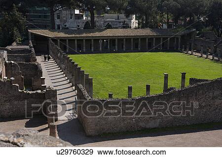 Stock Photo - In the shadow of Vesuvius, the ruins of Pompei - quadriporticus of Great Theatre . Fotosearch