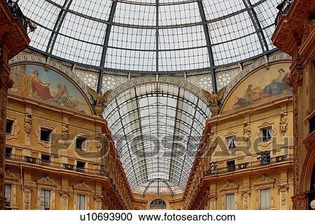Interior view of Galleria Vittorio Emmanuele, Milan showing glass roof View Large Photo Image Stock Image - Interior view of Galleria Vittorio Emmanuele, Milan showing glass roof. Fotosearch