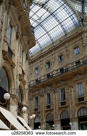 Interior view of Galleria Vittorio Emmanuele, Milan showing glass roof View Large Photo Image Stock Image - Interior view of Galleria Vittorio Emmanuele, Milan showing glass roof. Fotosearch