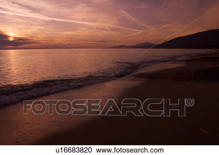 Italian beach at sunset, with motion blur of waves View Large Photo Image Stock Image - Italian beach at sunset, with motion blur of waves. Fotosearch