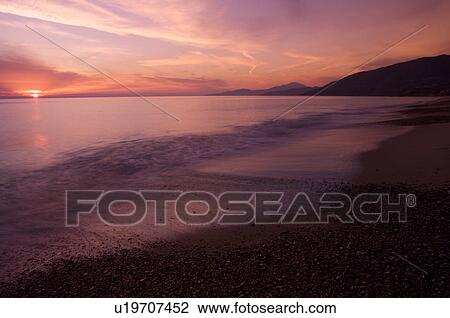 Italian beach at sunset, with motion blur of waves View Large Photo Image Stock Image - Italian beach at sunset, with motion blur of waves. Fotosearch