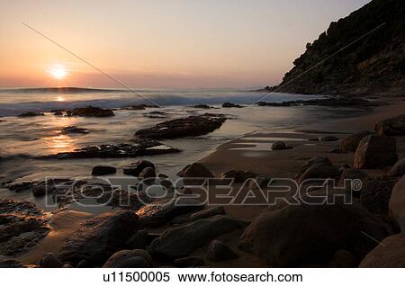 Italian beach at sunset, with motion blur of waves View Large Photo Image Stock Photography - Italian beach at sunset, with motion blur of waves. Fotosearch