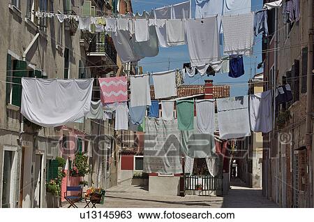 Laundry hanging in street on sunny morning in Venice View Large Photo Image Stock Image - Laundry hanging in street on sunny morning in Venice. Fotosearch
