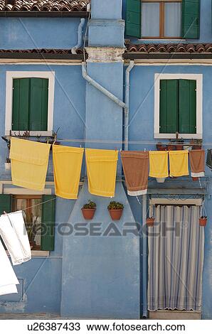 Laundry hanging on sunny day in Burano View Large Photo Image Stock Image - Laundry hanging on sunny day in Burano. Fotosearch