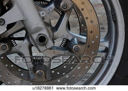 Stock Image - Mechanical Detail of motorbike -disc brake,. Fotosearch