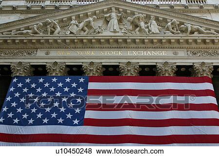 Stock Photo - New York Stock Exchange facade detail with flag. Fotosearch