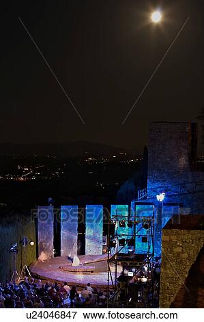 Outdoor night-time staging of opera Carmen beside medieval walls under full moon, Italy View Large Photo Image Stock Photo - Outdoor night-time staging of opera Carmen beside medieval walls under full moon, Italy. Fotosearch