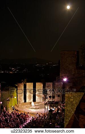 Outdoor night-time staging of opera Carmen beside medieval town wall, under full moon View Large Photo Image Stock Photography - Outdoor night-time staging of opera Carmen beside medieval town wall, under full moon. Fotosearch