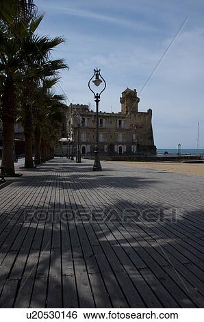 Stock Photograph - Santa Maria Castellabate boardwalk on sunny day. Fotosearch