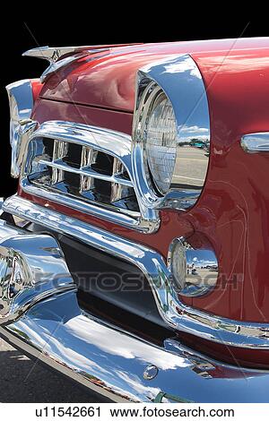 Side (quarter) view of old red Chrysler showing detail of front grille, headlamp, and hood ornament View Large Photo Image Stock Image - Side (quarter) view of old red Chrysler showing detail of front grille, headlamp, and hood ornament. Fotosearch