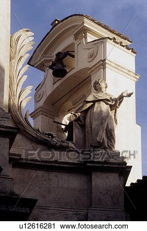 Statue detail on facade of S. Andrea al Quirinale, with bell tower, Rome, Italy View Large Photo Image Stock Image - Statue detail on facade of S. Andrea al Quirinale, with bell tower, Rome, Italy. Fotosearch