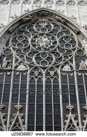 Stone sculpture detail of facade and arched window, Milan cathedral View Large Photo Image Stock Photo - Stone sculpture detail of facade and arched window, Milan cathedral. Fotosearch