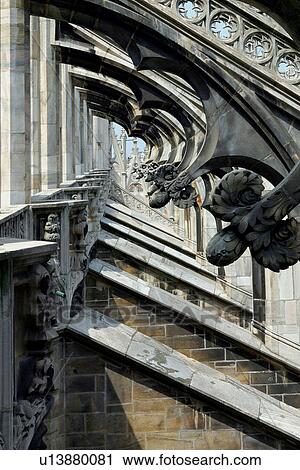 Stone sculpture detail of flying buttress, Milan cathedral View Large Photo Image Stock Image - Stone sculpture detail of flying buttress, Milan cathedral. Fotosearch