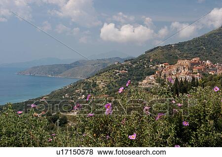 Stock Photo - Town of Pisciotta, with surrounding countryside and coastline. Fotosearch