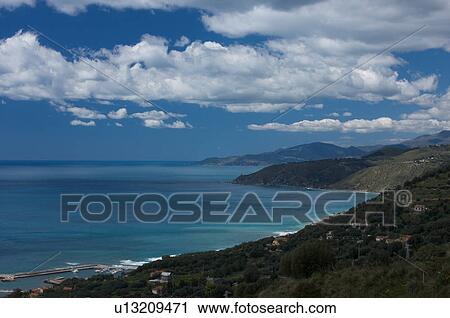 View of coastline near Pischiotta on sunny spring day View Large Photo Image Stock Image - View of coastline near Pischiotta on sunny spring day. Fotosearch