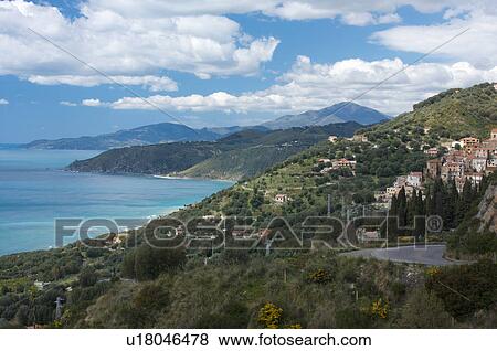Stock Photo - View of coastline near Pischiotta on sunny spring day. Fotosearch