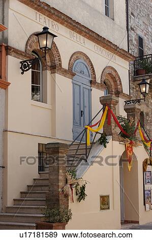 Stock Photo - view of Teatro della Concordia, the smallest theatre in the world, in historic centre of MonteCastello di Vibio, Umbria, Italy. Fotosearch