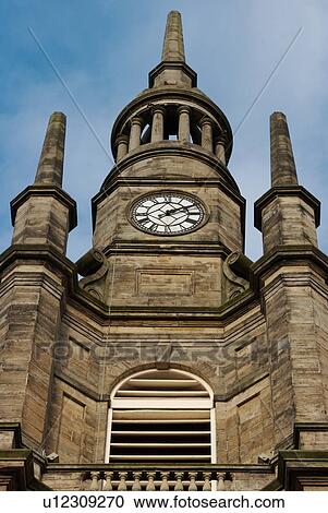 View upwards of church spire and side turrets, against blue sky, St. George's, Buchanan Street, Glasgow View Large Photo Image Stock Image - View upwards of church spire and side turrets, against blue sky, St. George's, Buchanan Street, Glasgow. Fotosearch