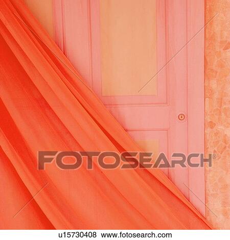 Close-up of a gauze curtain in front of a closed door View Large Photo Image Stock Photo - Close-up of a gauze curtain in front of a closed door. Fotosearch