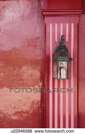 Close-up of a lantern mounted on a wall View Large Photo Image Stock Photo - Close-up of a lantern mounted on a wall. Fotosearch