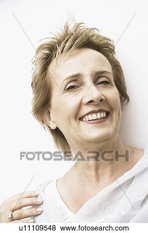 Stock Photo - Close-up of a mature woman smiling. Fotosearch