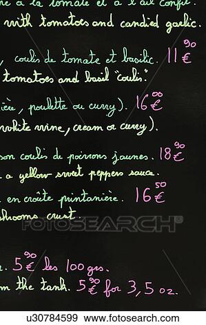 Stock Photo - Close-up of a menu list on a blackboard. Fotosearch