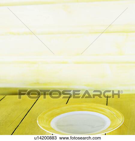 Close-up of a plate on a table View Large Photo Image Stock Image - Close-up of a plate on a table. Fotosearch