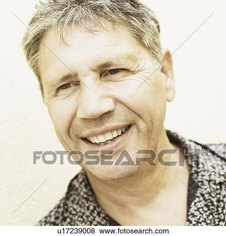 Close-up of a senior man smiling View Large Photo Image Stock Photo - Close-up of a senior man smiling. Fotosearch