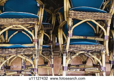 Close-up of a stack of bamboo chairs in a store View Large Photo Image Stock Image - Close-up of a stack of bamboo chairs in a store. Fotosearch