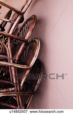 Close-up of a stack of bamboo chairs in a store View Large Photo Image Stock Photo - Close-up of a stack of bamboo chairs in a store. Fotosearch