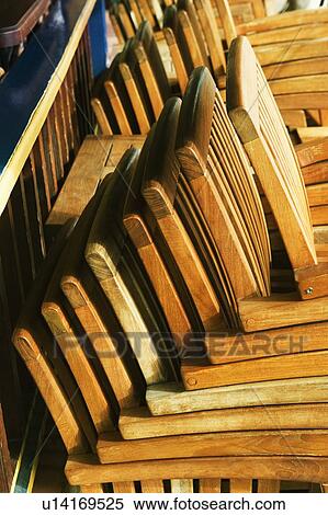 Stock Photography - Close-up of a stack of chairs in a store. Fotosearch