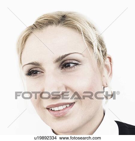 Picture - Close-up of a waiter smiling. Fotosearch