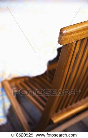 Stock Photography - Close-up of an empty chair. Fotosearch
