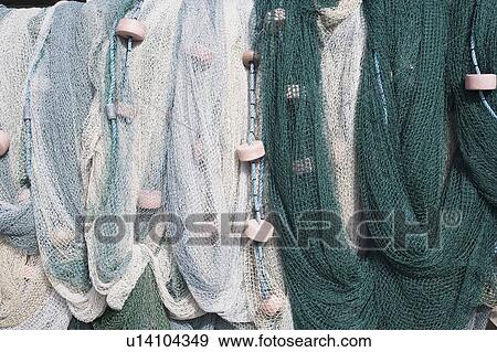 Close-up of commercial fishing nets View Large Photo Image Stock Photo - Close-up of commercial fishing nets. Fotosearch