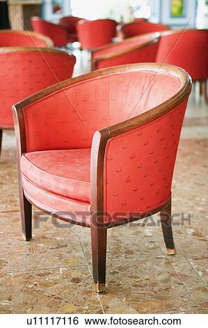 Close-up of empty chairs in a lobby View Large Photo Image Stock Photograph - Close-up of empty chairs in a lobby. Fotosearch