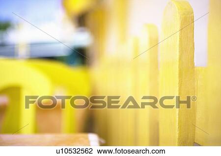 Close-up of empty tables and chairs in a restaurant View Large Photo Image Stock Image - Close-up of empty tables and chairs in a restaurant. Fotosearch