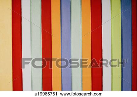 Stock Image - Close-up of multi-colored wooden paneling. Fotosearch