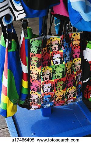 Close-up of shopping bags hanging at a market stall View Large Photo Image Stock Photography - Close-up of shopping bags hanging at a market stall. Fotosearch