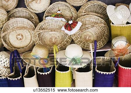 Close-up of wicker baskets and hand bags with straw hats View Large Photo Image Stock Photography - Close-up of wicker baskets and hand bags with straw hats. Fotosearch