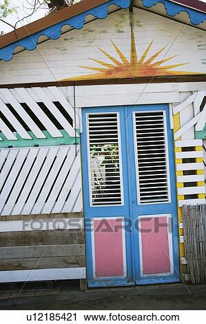 Stock Image - Facade of a hut. Fotosearch
