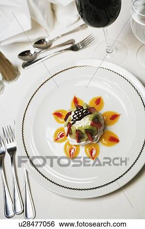 Stock Photograph - High angle view of a decorated dessert in a plate. Fotosearch