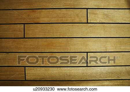 Stock Image - High angle view of a floorboard. Fotosearch
