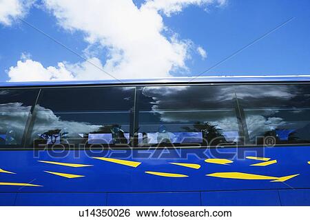 Stock Photograph - Low angle view of a bus. Fotosearch