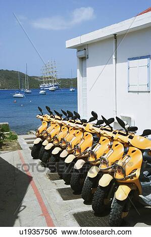 Stock Photograph - Motor scooters in a row. Fotosearch