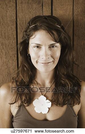 Portrait of a mid adult woman smiling View Large Photo Image Stock Image - Portrait of a mid adult woman smiling. Fotosearch