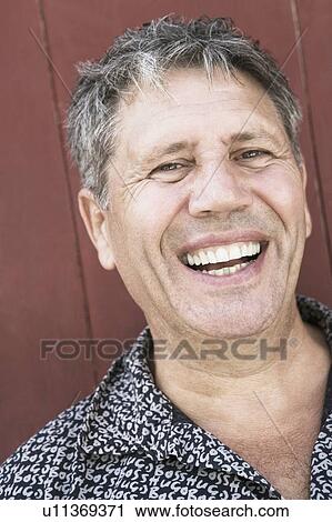 Portrait of a senior man smiling View Large Photo Image Stock Image - Portrait of a senior man smiling. Fotosearch