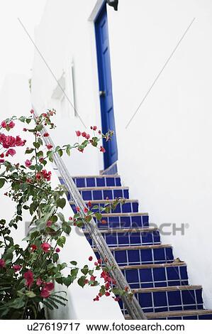 Stock Photo - Steps leading to the door of a house. Fotosearch