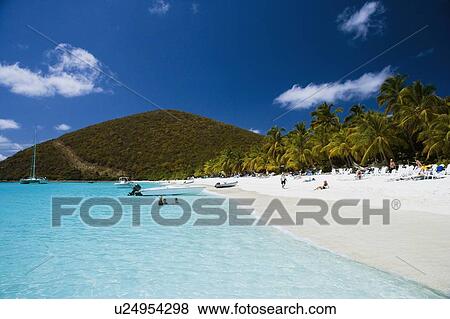 Tourists on the beach View Large Photo Image Stock Photo - Tourists on the beach. Fotosearch